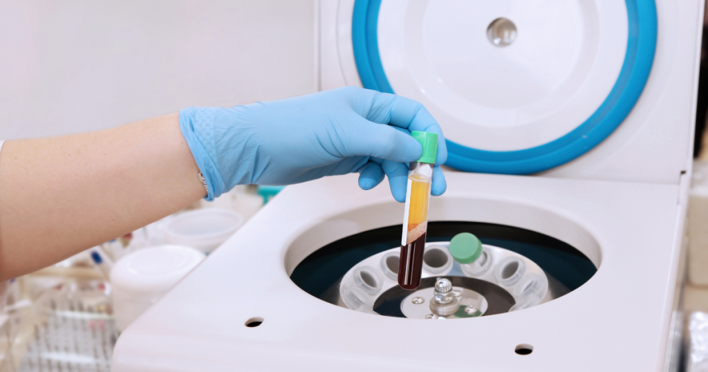 blood being put in a centrifuge