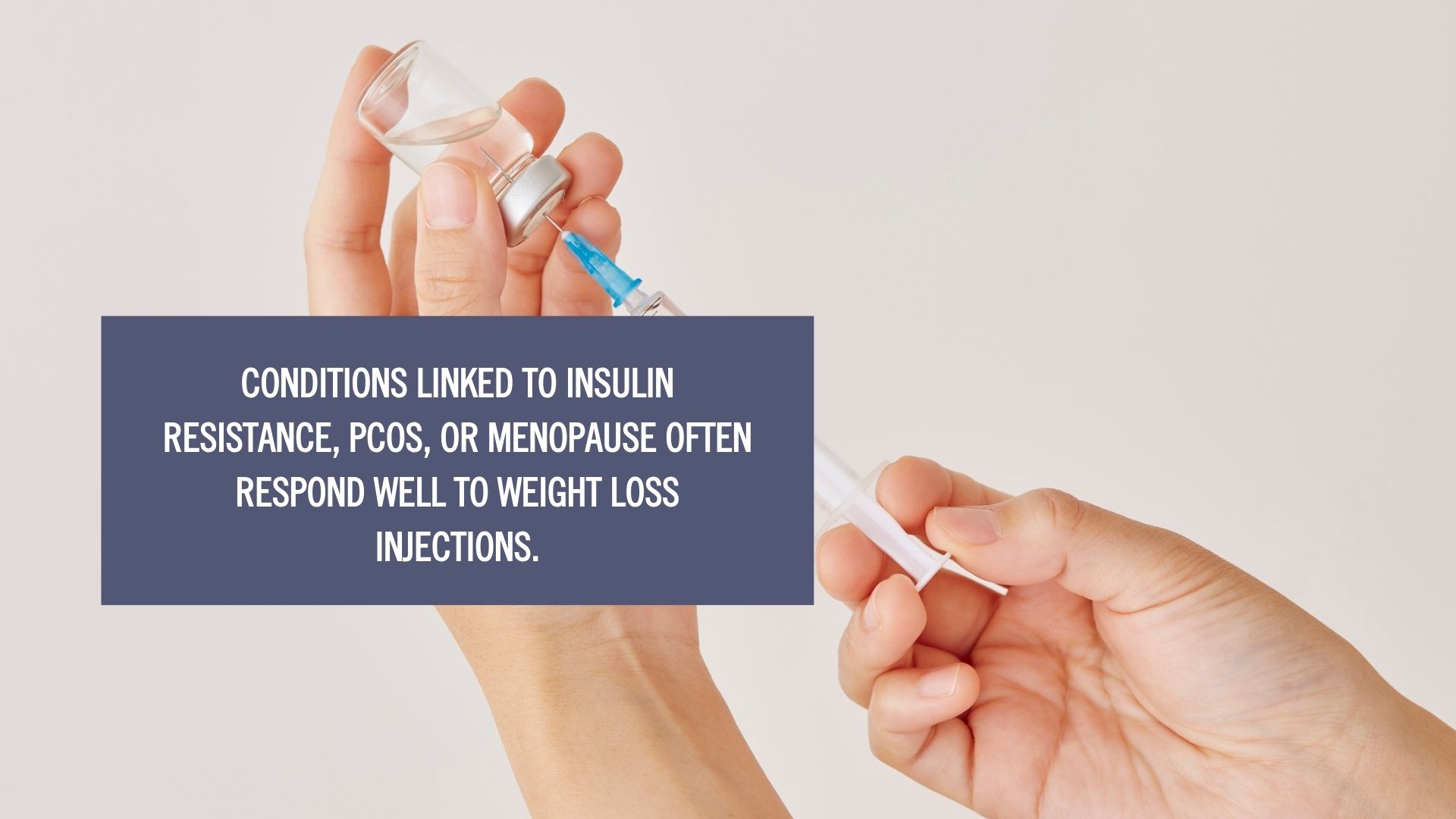 a hand holding weight loss injection