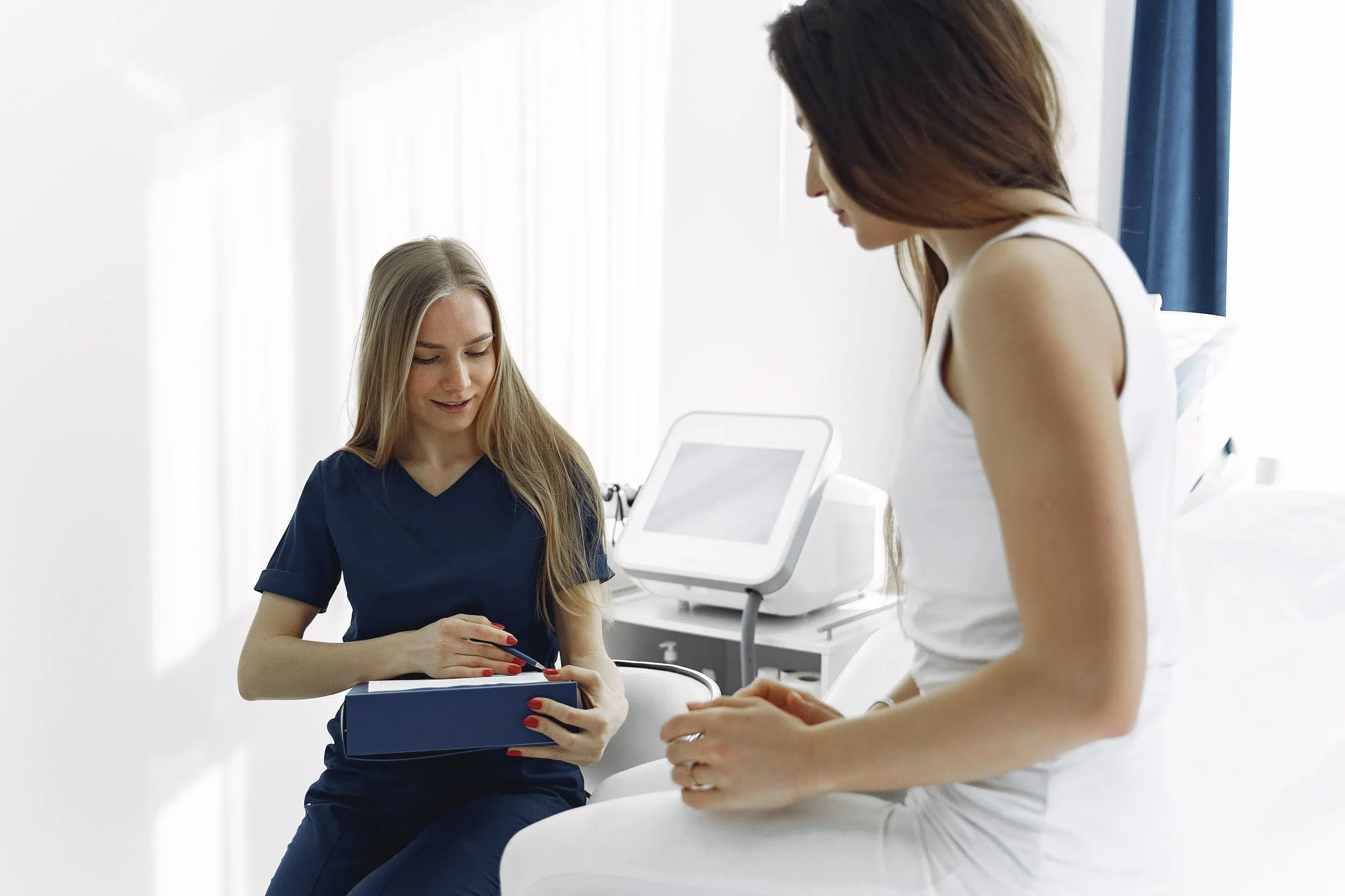 Medical professional explaining hormone laboratory reference ranges to a patient